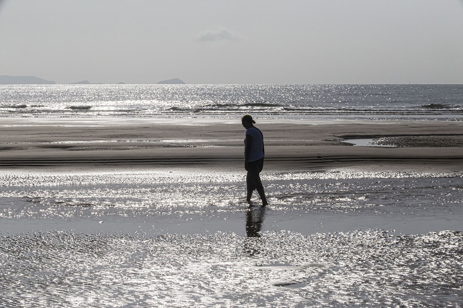 Angela walking on the beach