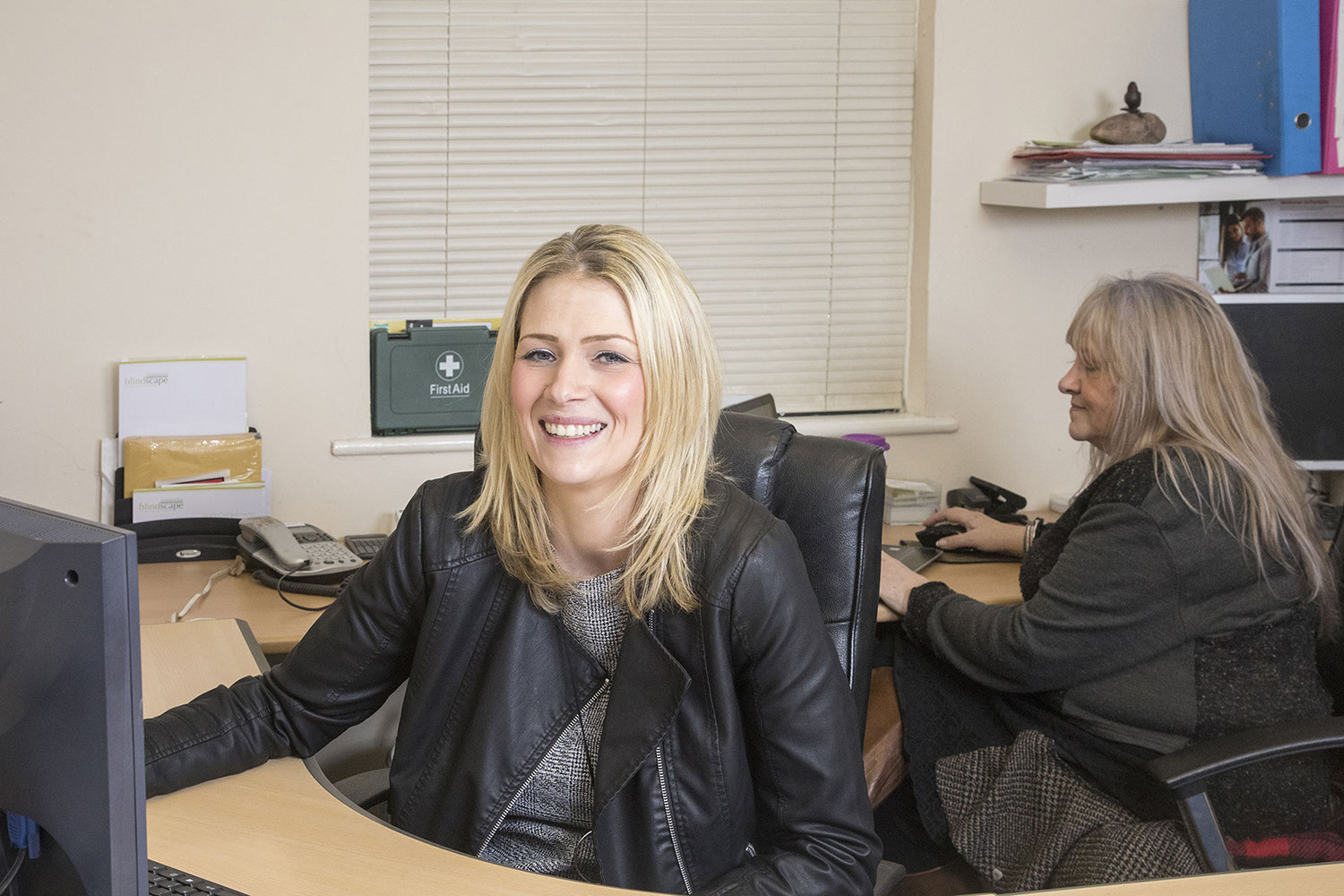 Advertising shoot of staff in Saless office.